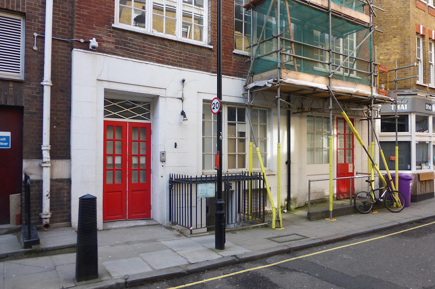 View from street of the outside of 16 Riding House Street. Shows entrance to Soho Poly Theatre.