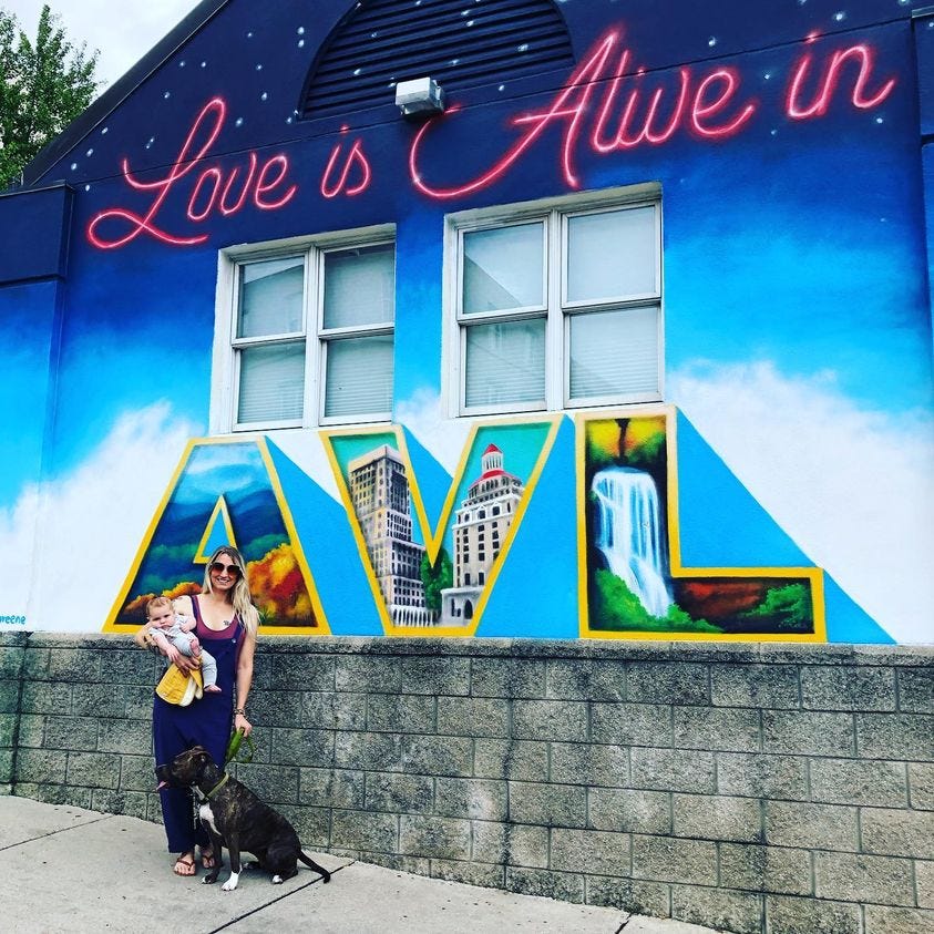 May be an image of standing, outdoors and text that says 'in Love is Alive A'