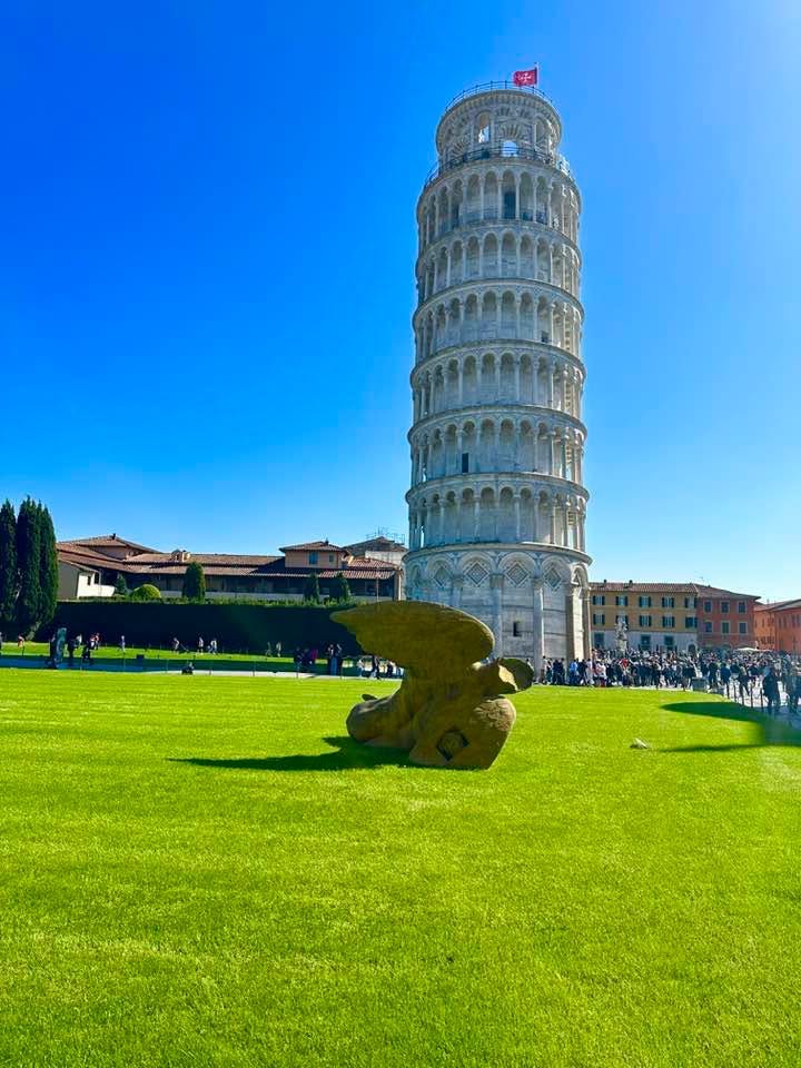 May be an image of bell tower and the Leaning Tower of Pisa