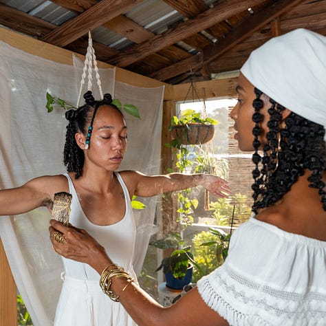 Temakha facilitates a healing session for a young woman in savannah ga. 