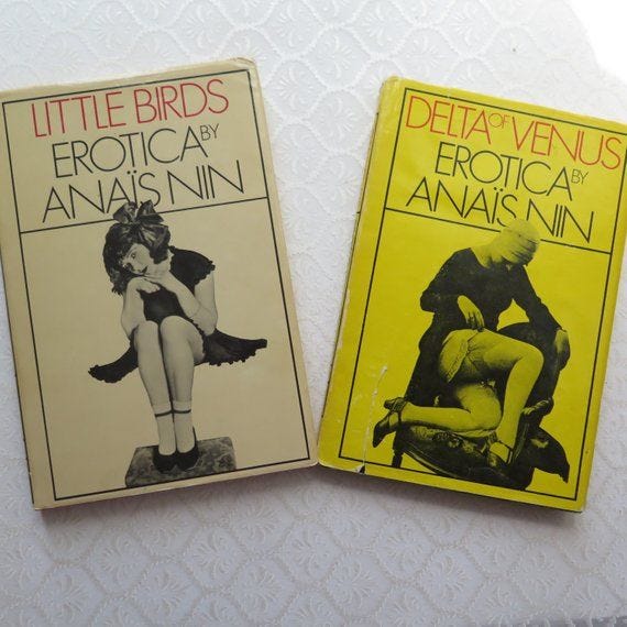 This may contain: two books sitting next to each other on a white tablecloth covered surface, one is yellow and the other is black