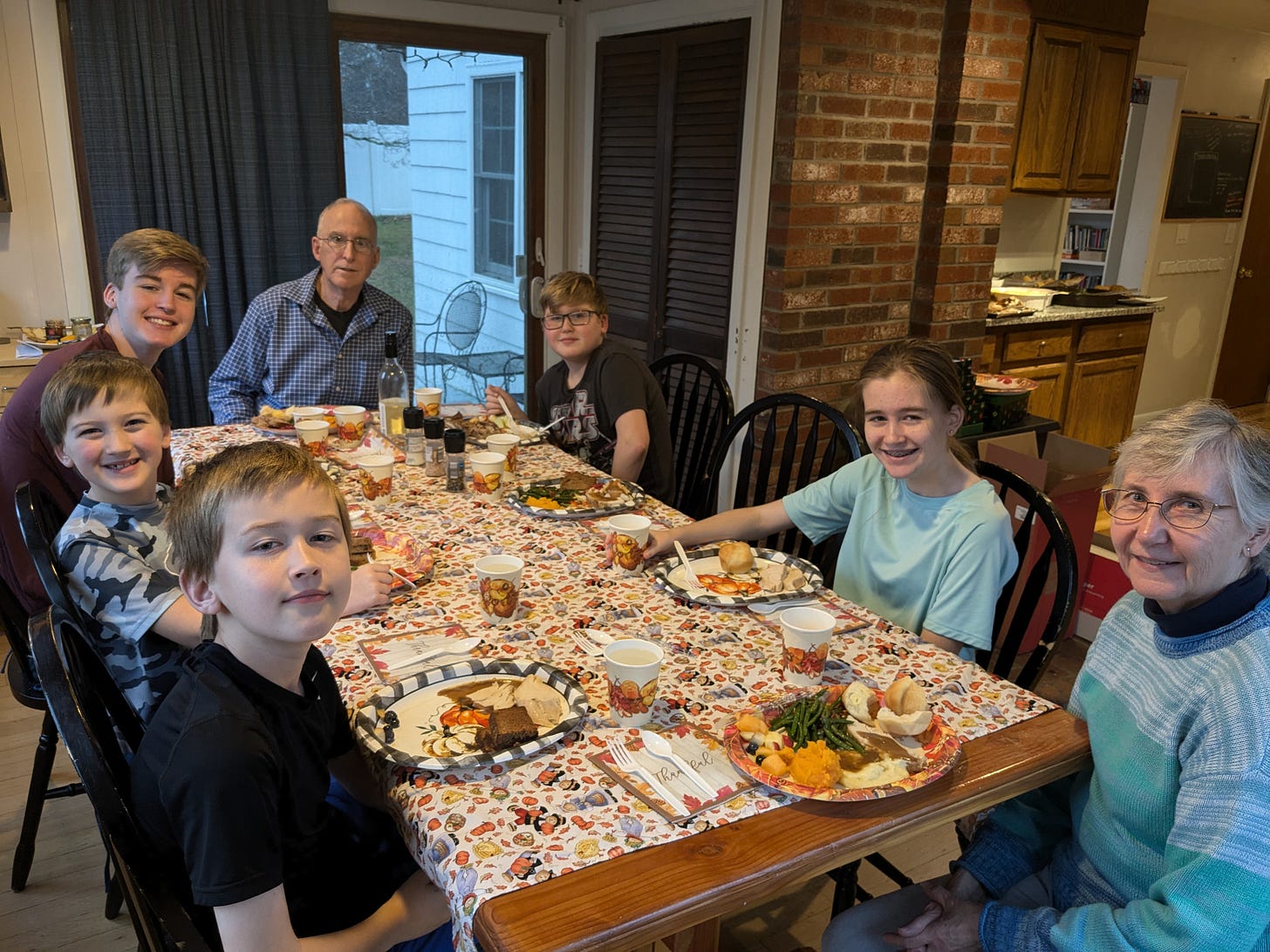 Family at Thanksgiving Table Family at Thanksgiving Table