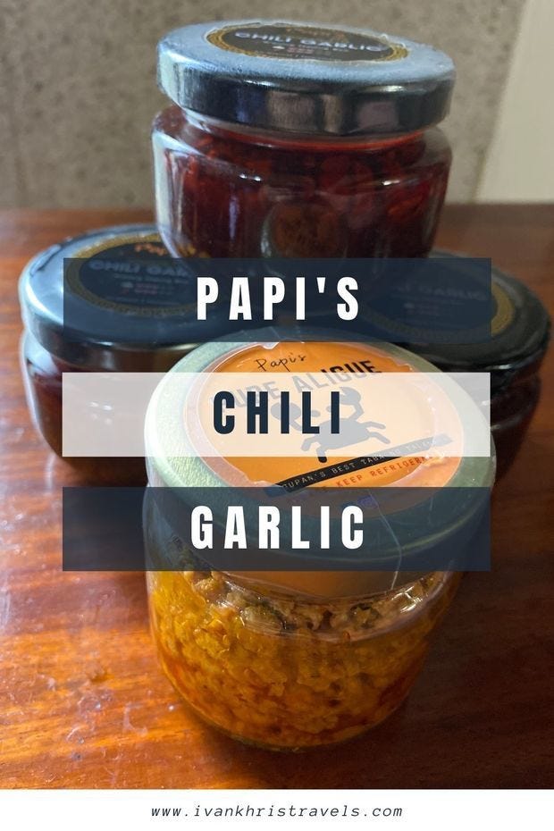 Papi's Chili Garlic Stack of Papi's Chili Garlic condiment and crab fat or pure aligue