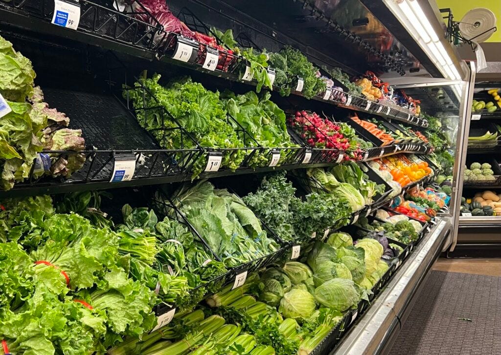 Vegetables and lettuces at a grocery store in Michigan. Michigan health officials say lettuces and salad greens are emerging as a likely source in the nationwide cyclosporiasis outbreak, which has sickened hundreds of people across 31 states. (Photo by Jon King/Michigan Advance) Vegetables and lettuces at a grocery store in Michigan. Michigan health officials say lettuces and salad greens are emerging as a likely source in the nationwide cyclosporiasis outbreak, which has sickened hundreds of people across 31 states. (Photo by Jon King/Michigan Advance)