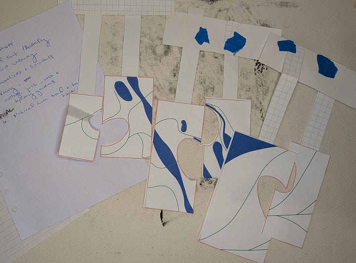 Image on the left shows six pieces of paper with diagrams on them. Image on the right shows six panels of fabric with similar diagrams, framing a view of a work of art on the far wall.