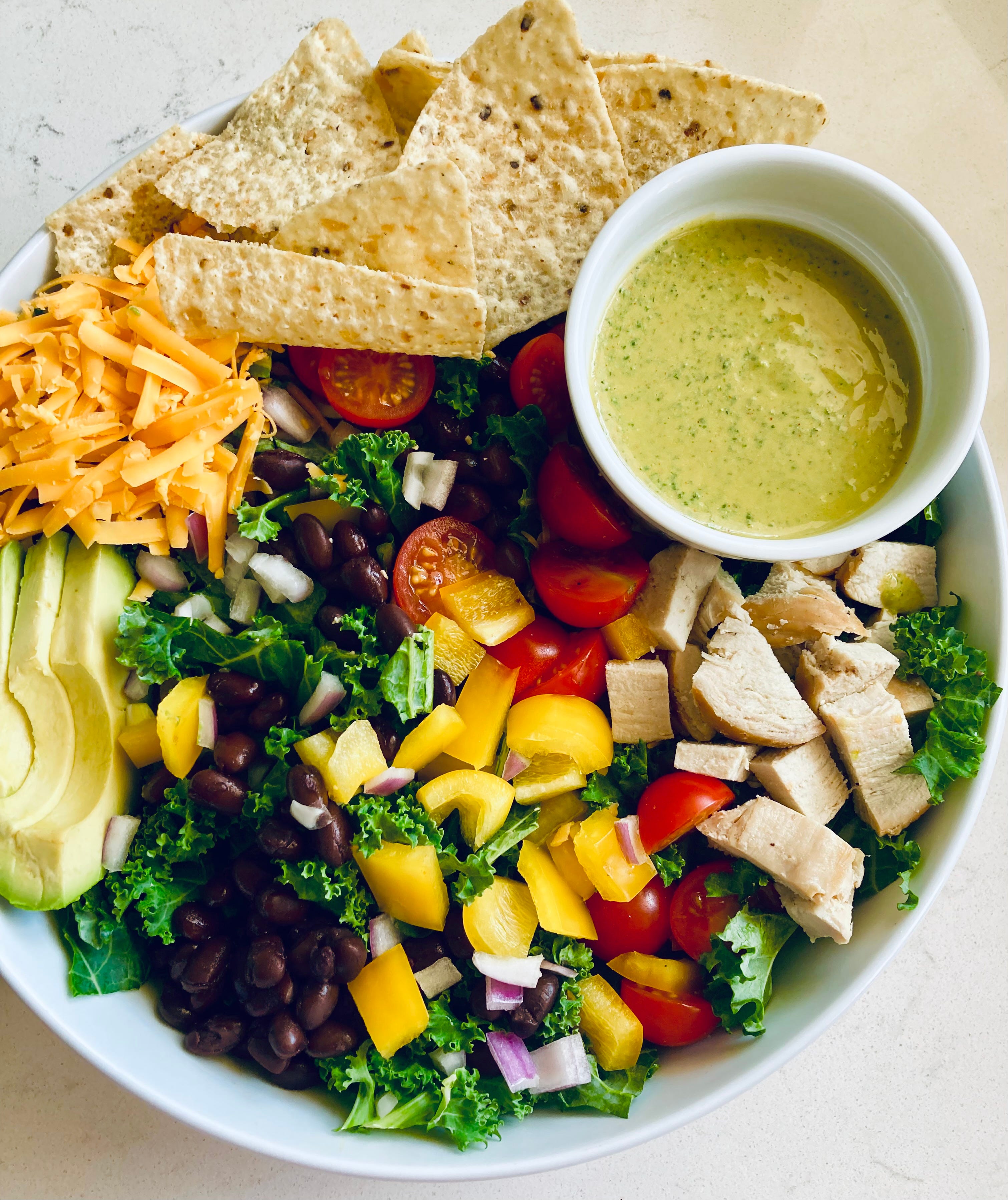 Kale taco salad with homemade creamy cilantro dressing Kale taco salad with homemade creamy cilantro dressing