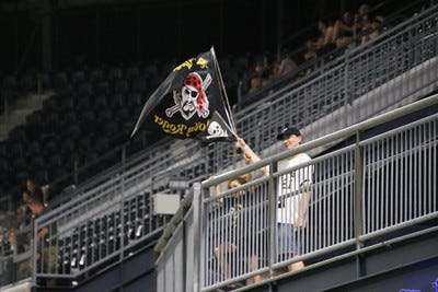 Pirates fan waving flag Pirates fan waving flag