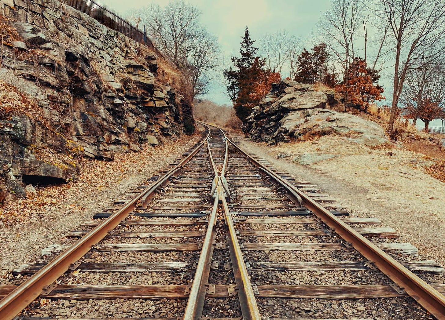 Two train tracks merging Two train tracks merging