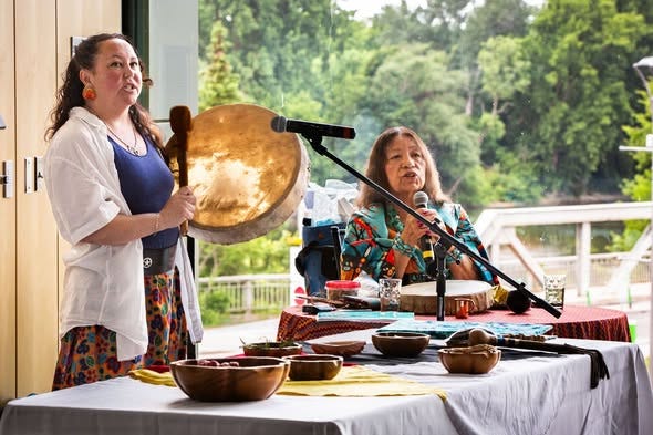 Two people are playing music and preparing a meal outdoors, with a variety of colorful dishes and utensils on display.
AI-generated content may be incorrect. Two people are playing music and preparing a meal outdoors, with a variety of colorful dishes and utensils on display.
AI-generated content may be incorrect.