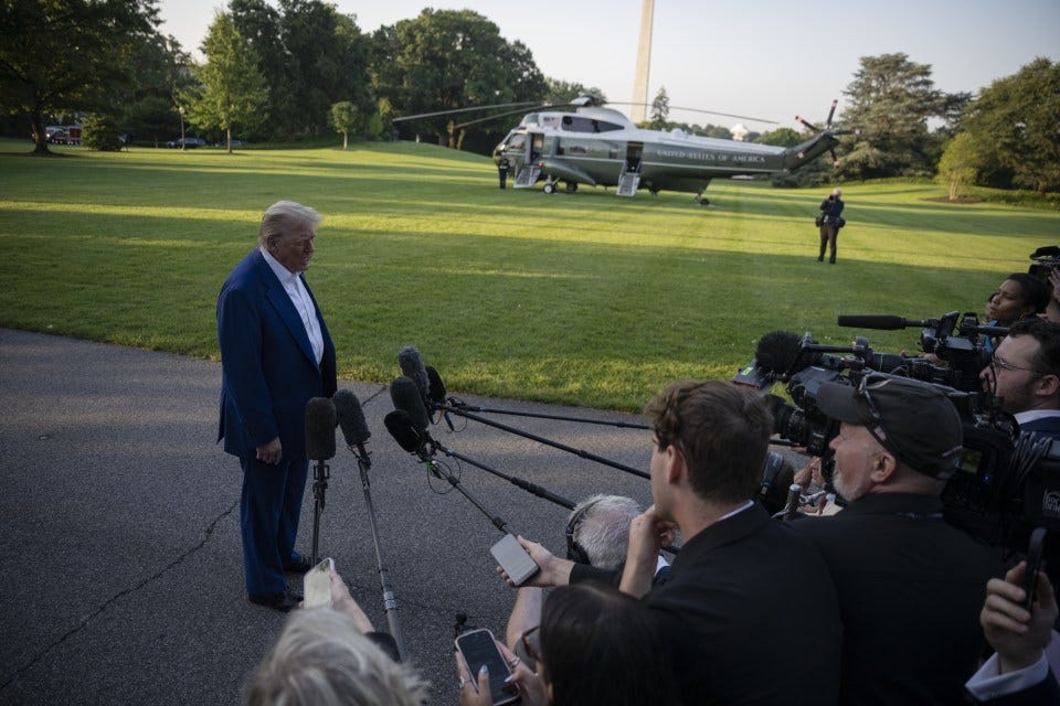 President Trump speaking to reporters at the White House.