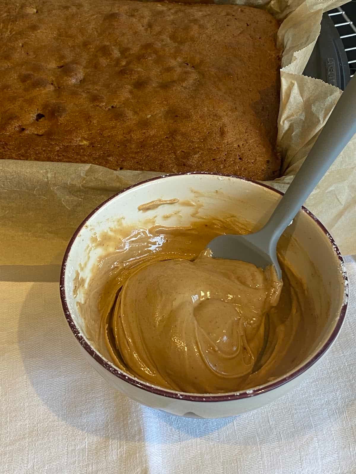 Coffee glaze in a small mixing bowl.