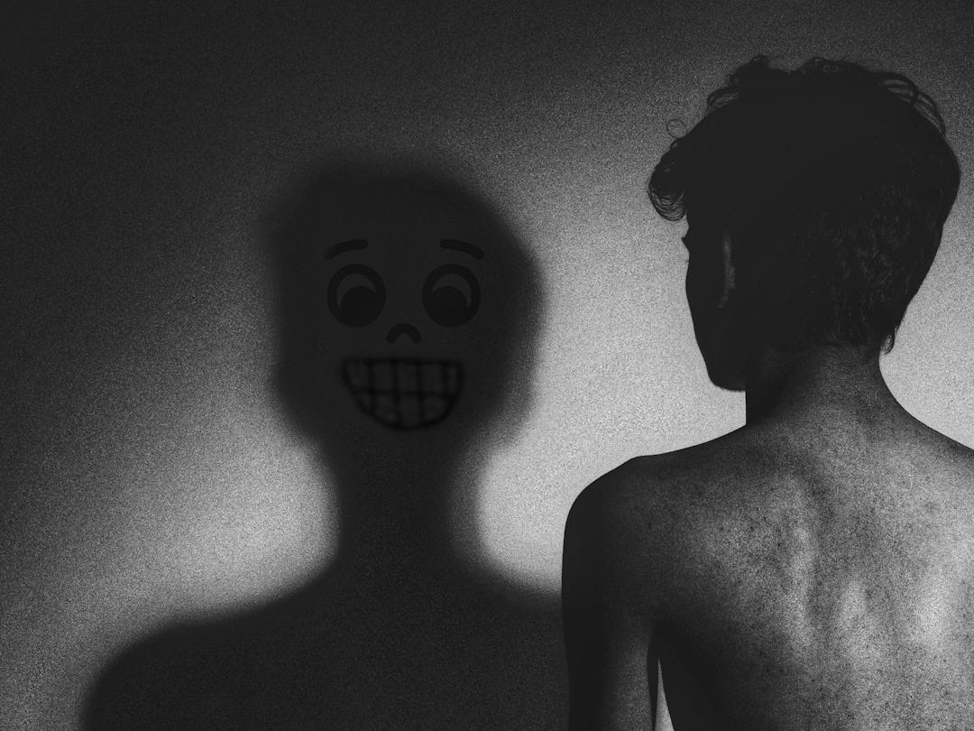 a boy looking at a skeleton