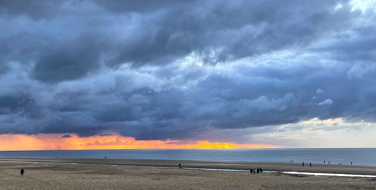 sunset on a rainy day in Renesse by Alexander Verbeek for The Planet newsletter the planet.substack.com