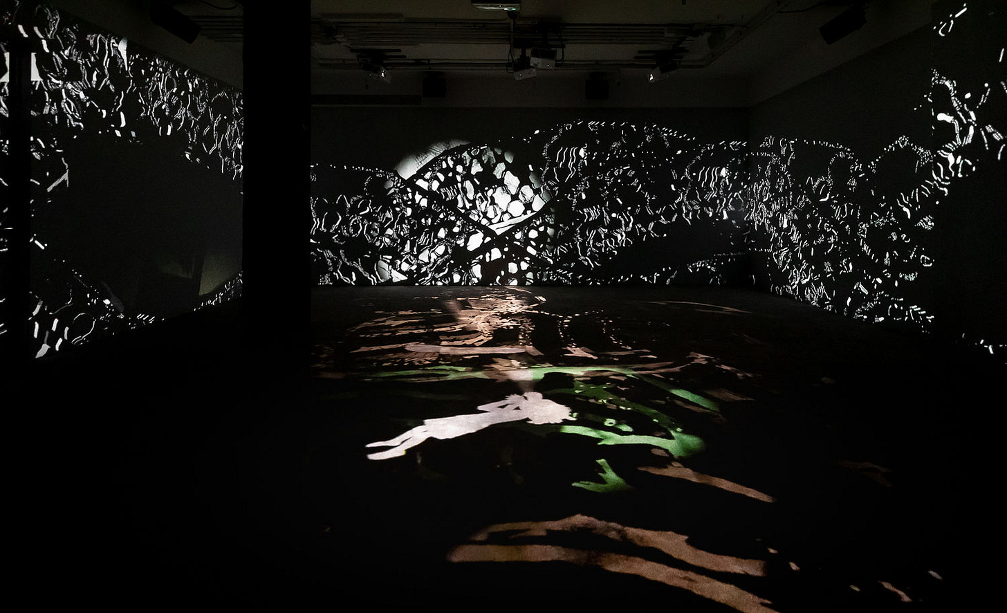 Image of multimedia installation with elements of shadow puppetry Image of multimedia installation with elements of shadow puppetry