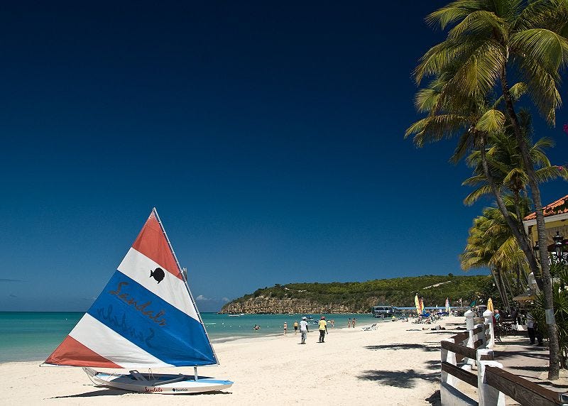 A sailboat on a beach

Description automatically generated