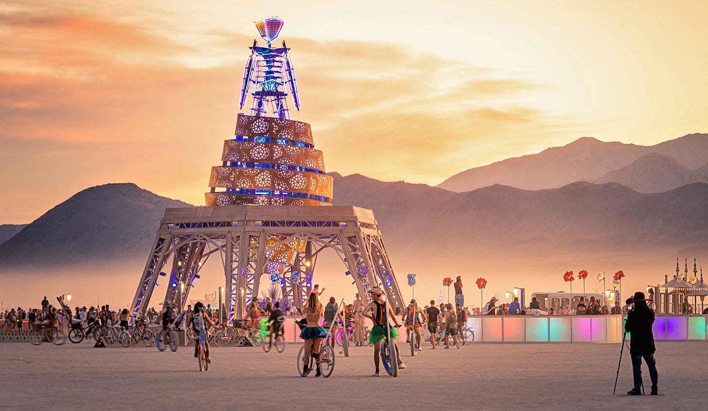 People gathered at sunset on the Playa at Burning Man