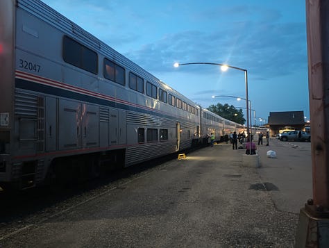 looking down the train, minot public library, minot train station, national park ranger, seattle ferry