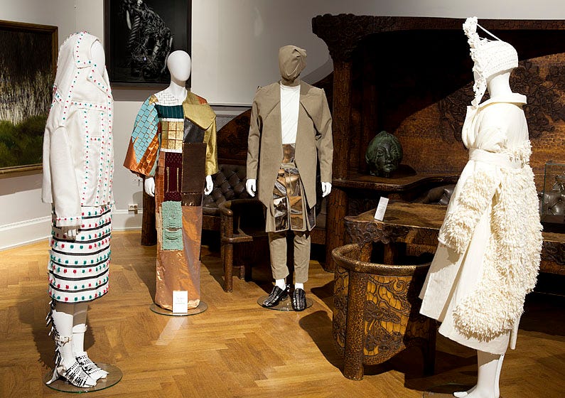 Ernst och Signe Thiel installation with the famous Gustaf Fjaestad couch by Beckman’s College of Design graduation fashion class students