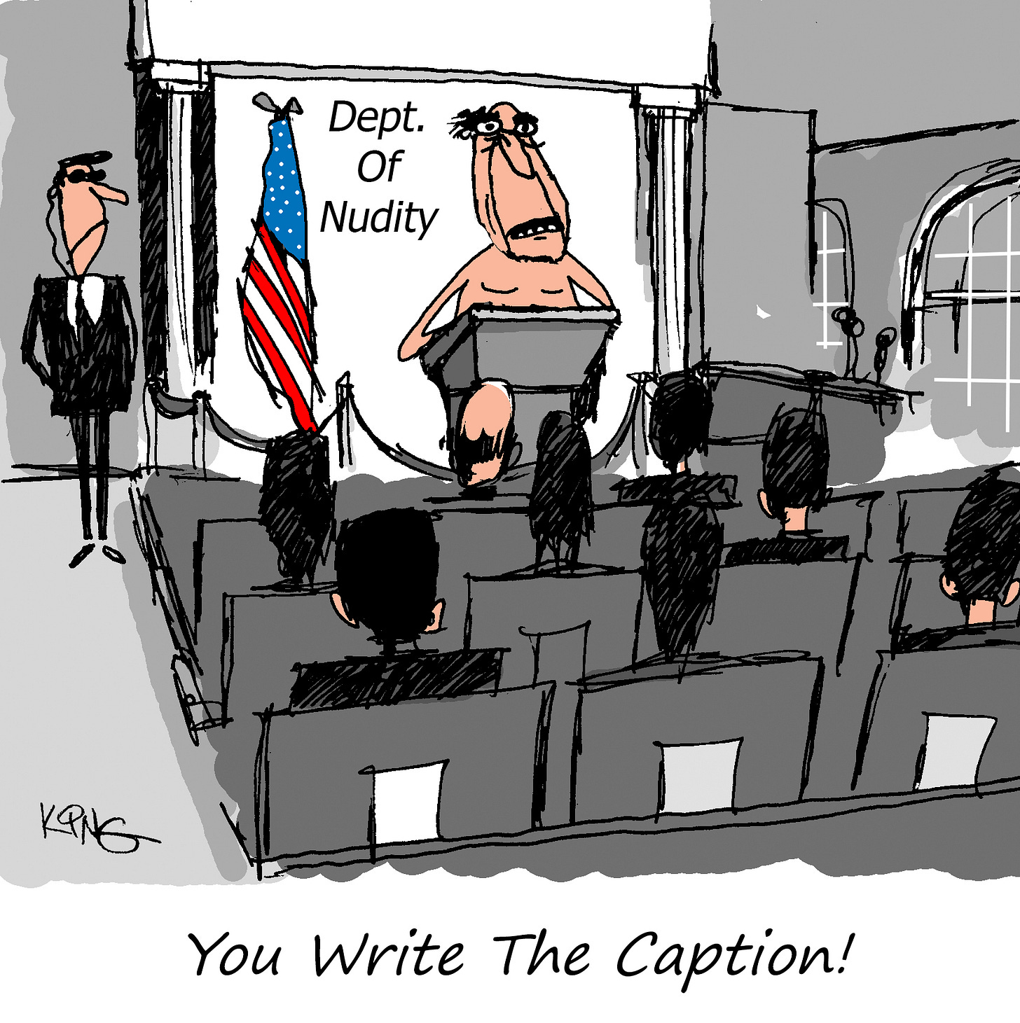 A single-panel cartoon shows a formal press conference. A nude man with a tense, slightly frazzled expression stands behind a podium, speaking in front of a backdrop that reads “Dept. Of Nudity.” An American flag stands beside him, and a suited security guard with sunglasses watches from the side. In the foreground, several nude reporters sit in rows of chairs facing the podium. Below the image, the text reads: “You Write The Caption!”