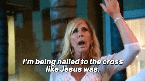 GIF of a woman saying, "I'm being nailed to the cross like Jesus was."