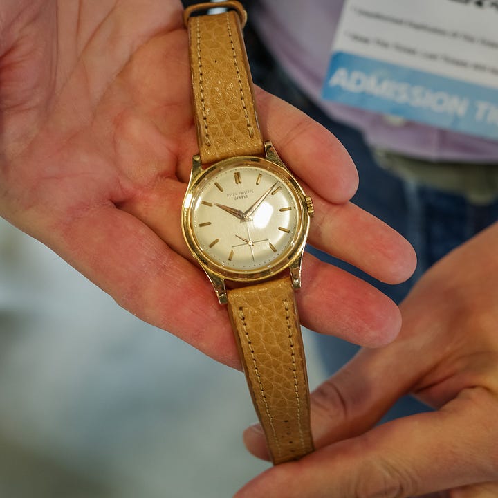 Patek Philippe 2509 and cartier tank cintree vintage watches