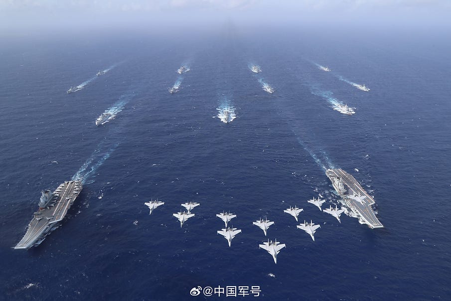 The Liaoning and Shandong participate in an exercise with both STOBAR J-15 and CATOBAR J-15T fighter aircraft flying overhead The Liaoning and Shandong participate in an exercise with both STOBAR J-15 and CATOBAR J-15T fighter aircraft flying overhead