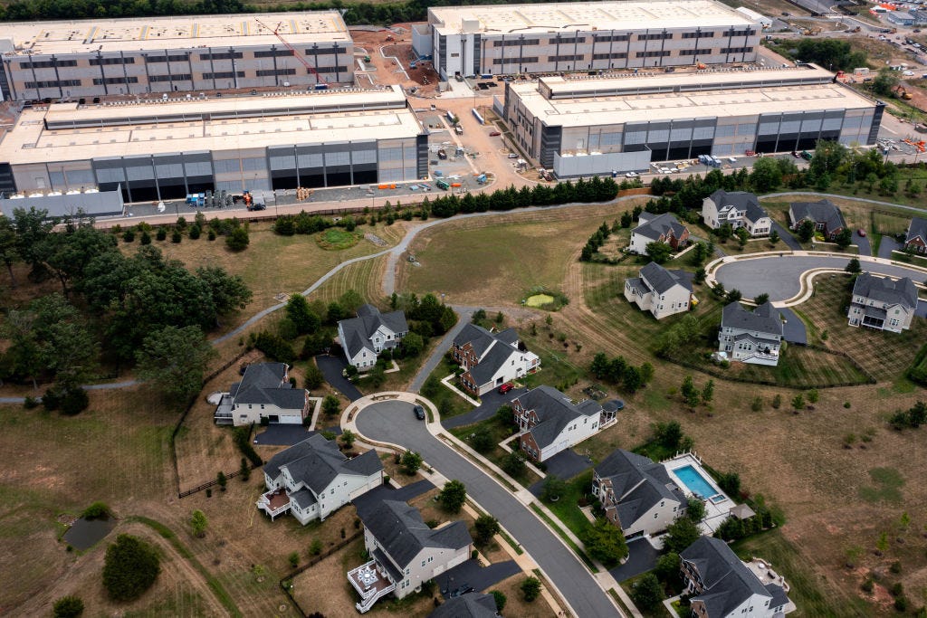 An Amazon Web Services data center is shown situated near single-family homes. Some local and state officials across the country want to halt development of the facilities. (Photo by Nathan Howard/Getty Images) An Amazon Web Services data center is shown situated near single-family homes. Some local and state officials across the country want to halt development of the facilities. (Photo by Nathan Howard/Getty Images)