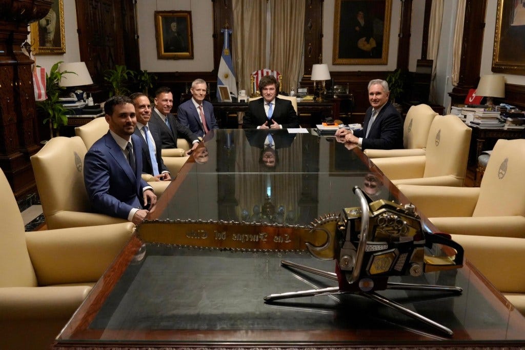 President Javier Milei (second from right) and Argentine officials welcome billionaire investor Peter Thiel (third from left) during a meeting at the Casa Rosada presidential palace in Buenos Aires last month.