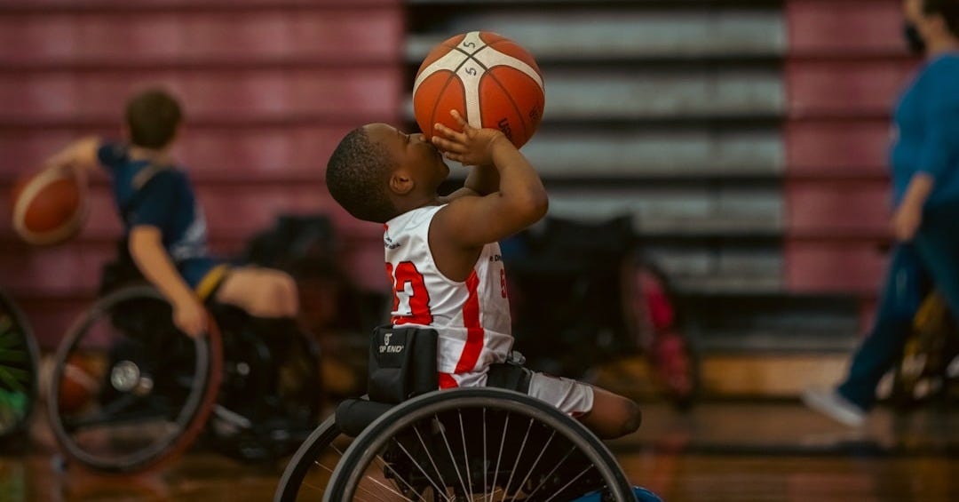 a boy playing basketball
