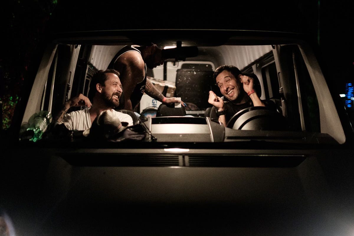 The author sitting behind the wheel of a tour van)