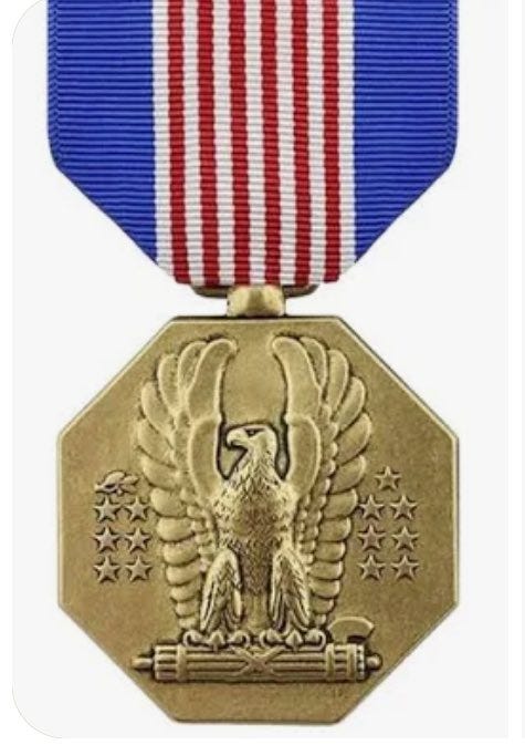 A gold medal with a red white and blue ribbon AI-generated content may be incorrect. A gold medal with a red white and blue ribbon AI-generated content may be incorrect.