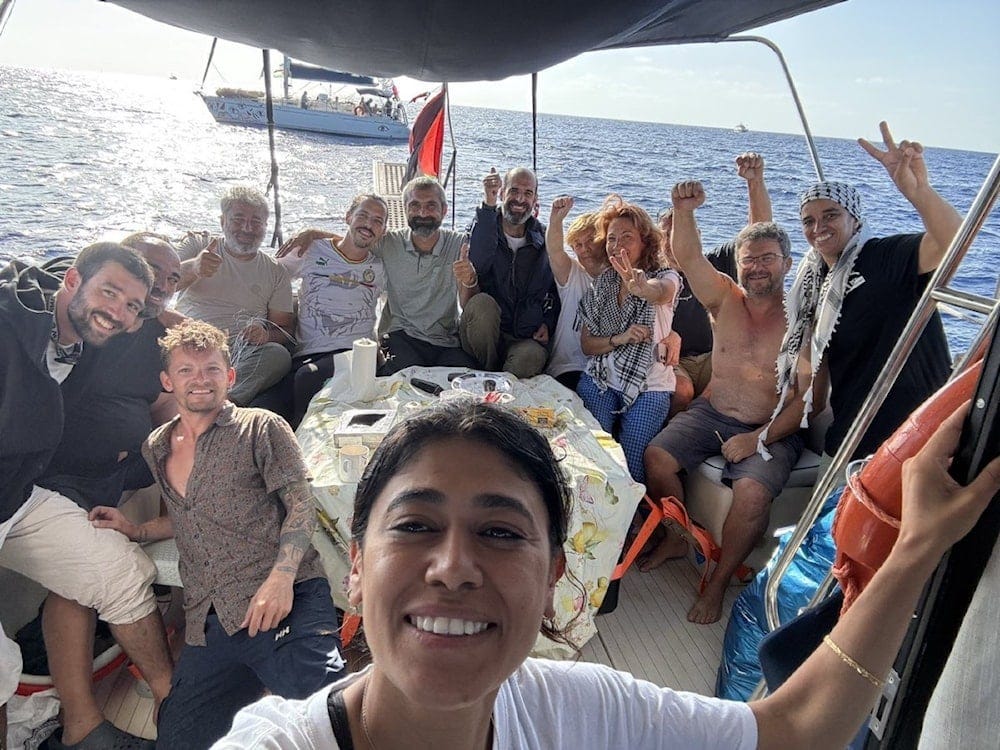 Lyna Al Tabal, third to the right, among the activists aboard the Global Sumud Flotilla heading towards Gaza to deliver humanitarian aid, in a picture posted by Al Tabal on her official X account on Oct. 9, 2025 (X | @lynaPERON ) Lyna Al Tabal, third to the right, among the activists aboard the Global Sumud Flotilla heading towards Gaza to deliver humanitarian aid, in a picture posted by Al Tabal on her official X account on Oct. 9, 2025 (X | @lynaPERON )