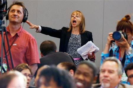 Obama in heated exchanges with Code Pink anti-war protester | Reuters