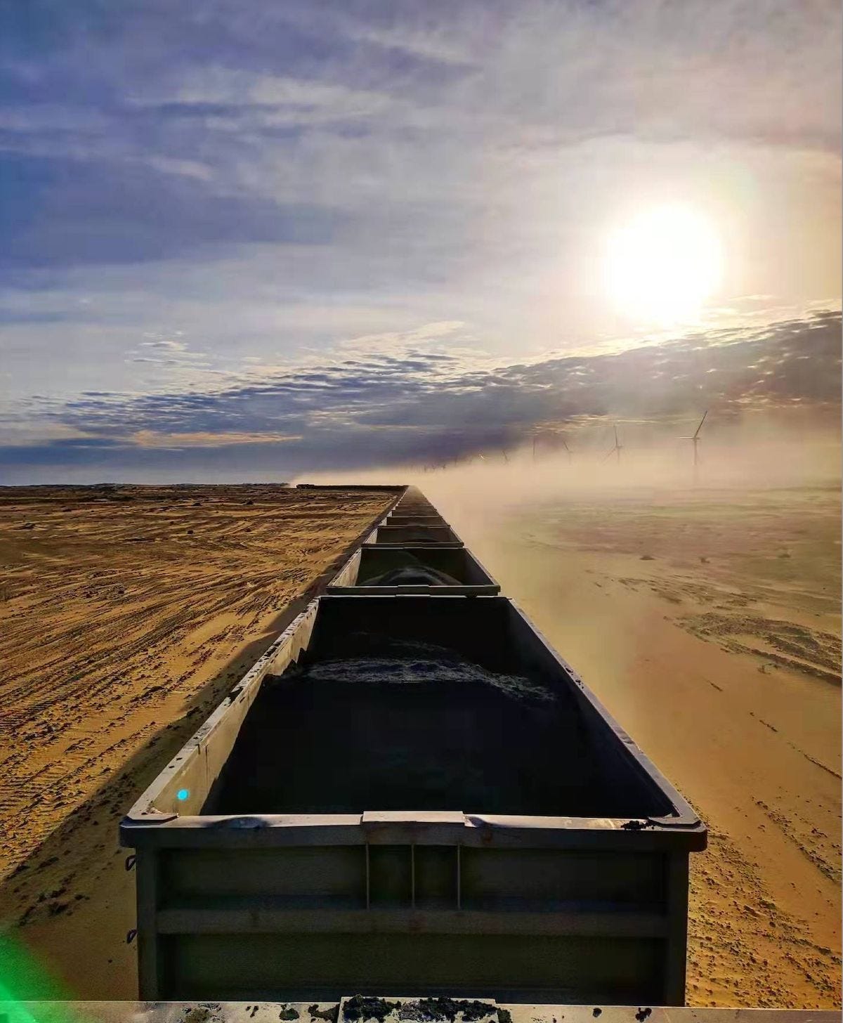 Adventure traveler riding the Mauritania Train across the Sahara Desert. Adventure traveler riding the Mauritania Train across the Sahara Desert.
