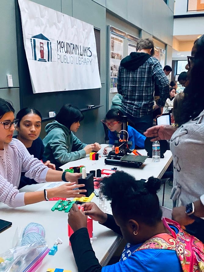 ML Makerspace students sharing projects with kids at the New Jersey Abacus Bee.