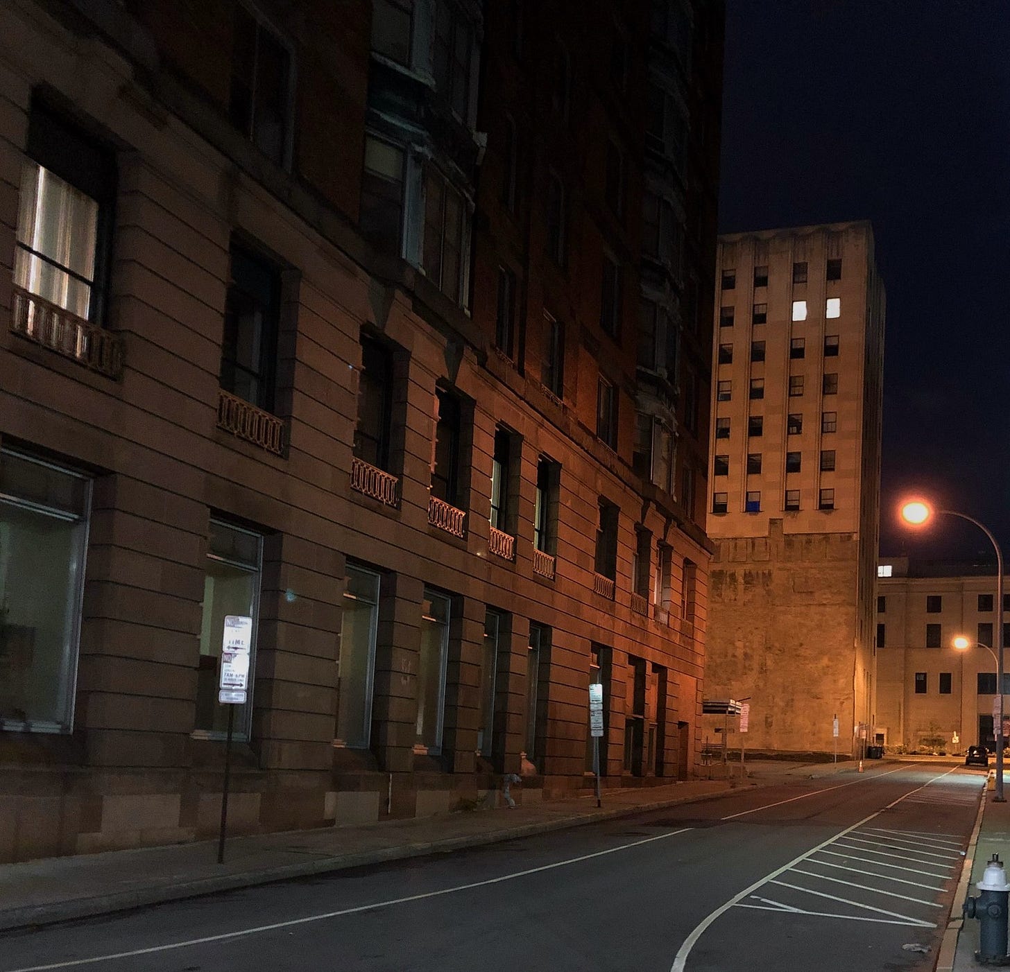 Rochester city street at night.
