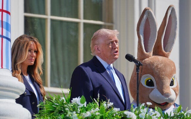 US President Donald Trump, center, the Easter Bunny, right, and first lady Melania Trump participate in the White House Easter Egg Roll on the South Lawn of the White House, Monday, April 6, 2026, in Washington. (AP/Mark Schiefelbein)