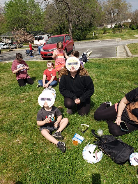 Three images of activities and fun during the Davie County Public Library Solar Eclipse Fun event.