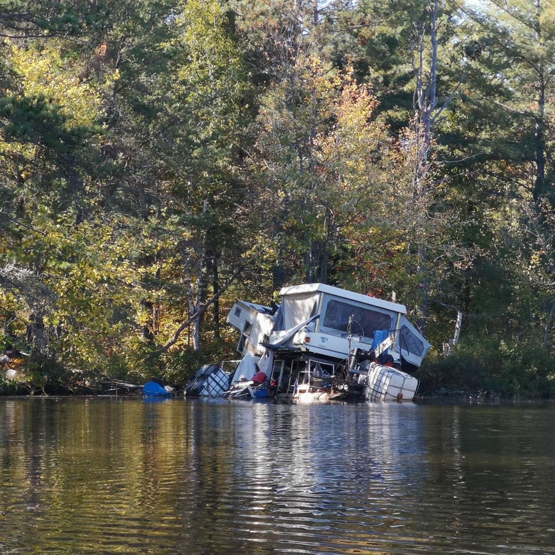 May be an image of boat and jet ski