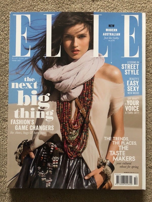 A magazine cover with a person on the cover

Description automatically generated