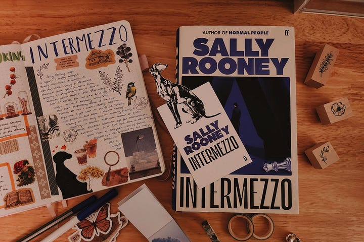 two images of bullet journal spreads about intermezzo by sally rooney and a november wrap up spread