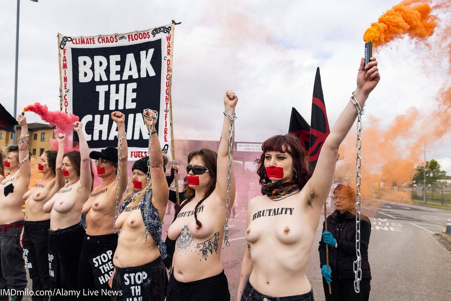 Three arrested as women and FINT protesters hold topless blockade at  Lakenheath air base - Extinction Rebellion UK