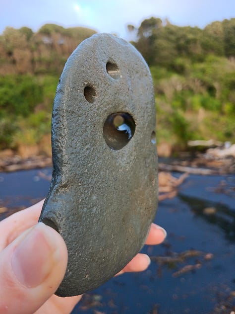 6 photos. 1. driftwood, 2 hagstone, 3. more driftwood and stacks behind, 4. swirling spume 5. a sea stack 6. wide shot stacks and sand and sea spume