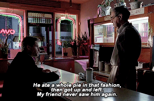 Mulder stands up from finishing a slice of pie, to pay the man working at the diner. A voiceover states: "He ate a whole pie in that fashion, then got up and left. My friend never saw him again." Mulder stands up from finishing a slice of pie, to pay the man working at the diner. A voiceover states: "He ate a whole pie in that fashion, then got up and left. My friend never saw him again."