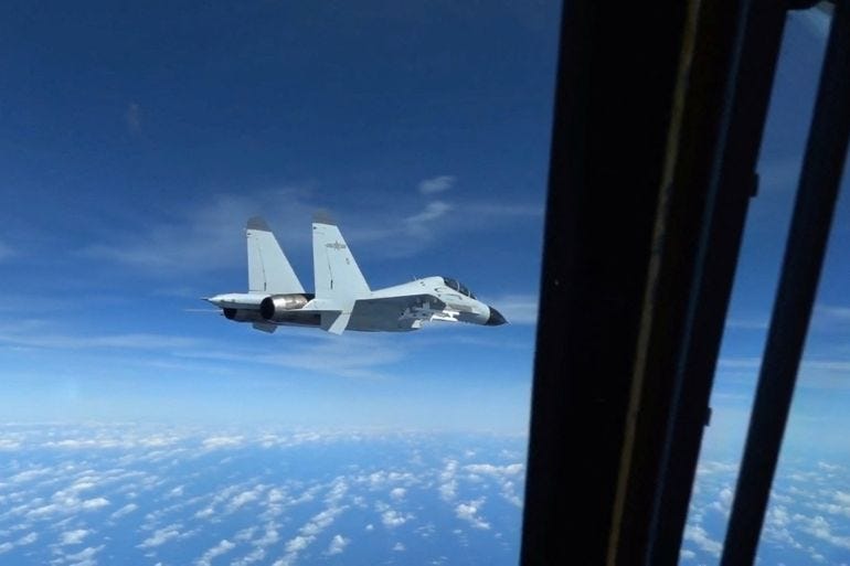 China fighter jet flew within six metres of US surveillance plane China fighter jet flew within six metres of US surveillance plane