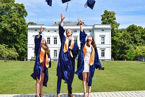 Graduates in front of an old chateau, five year high school reunion, five girls in Brussels