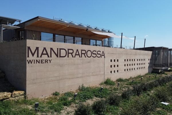 https://storiedelvino.it/wp-content/uploads/Mandrarossa-Winery-StudioCRU.jpeg