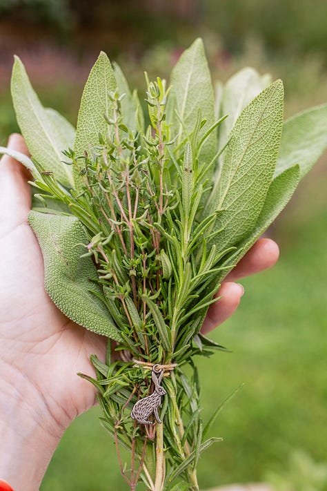 Brooms made with herbs and flowers. 