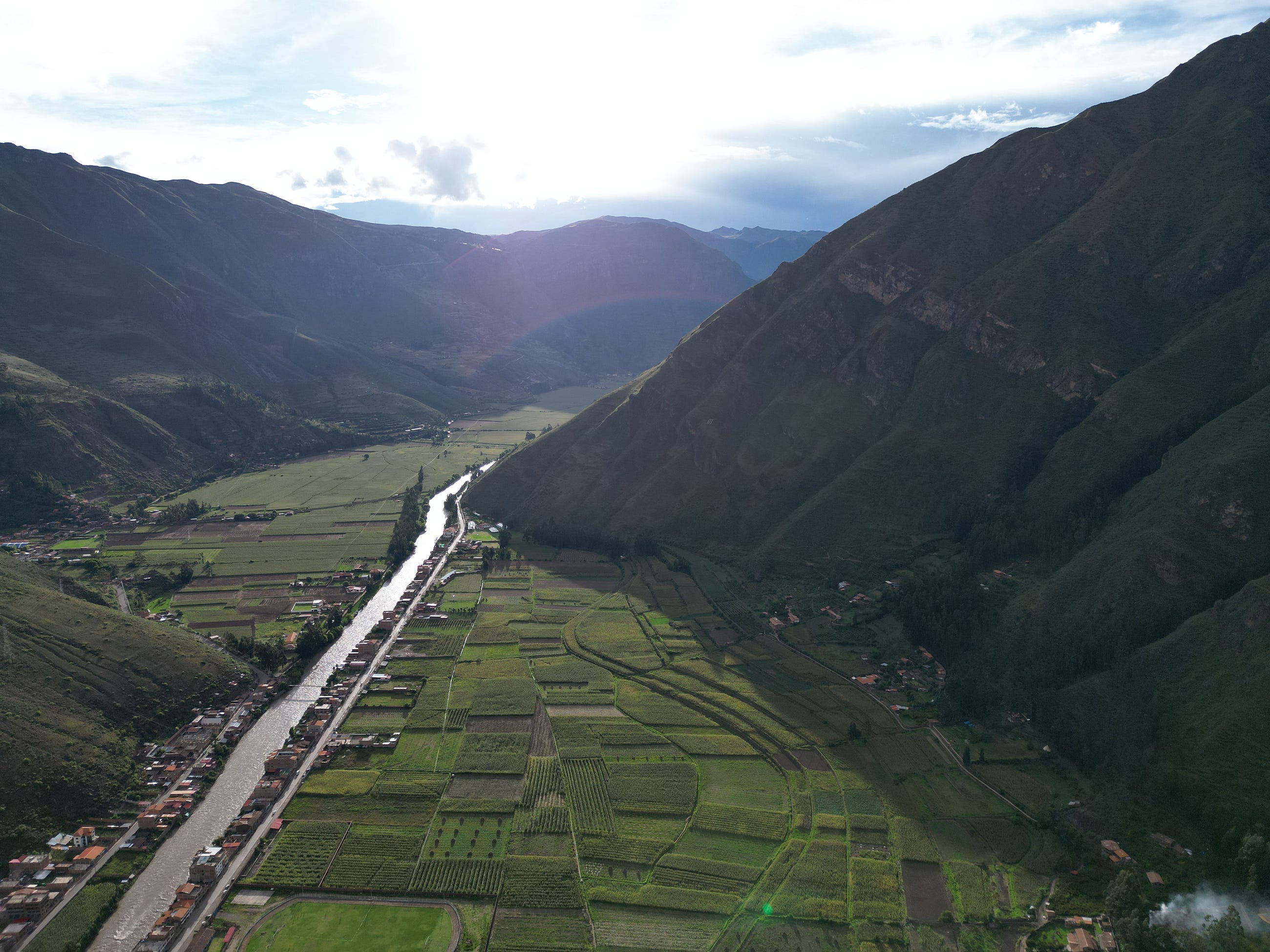 Photo of Sacred Valley during golden hour taken by author in Pisac, Peru