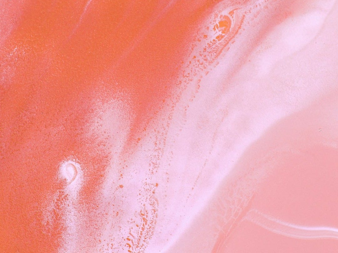 pink and white abstract painting